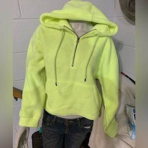 This is a crop sweat shirt women’s with hood. New with tag. Yellow hoodie
